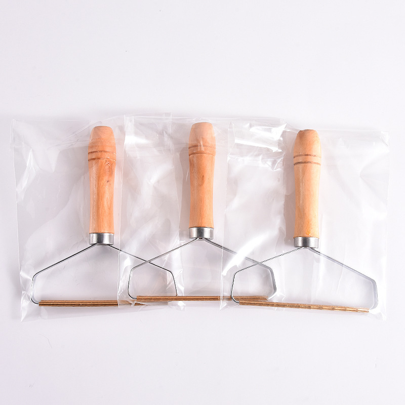 Wooden-Handle Lint Scraper