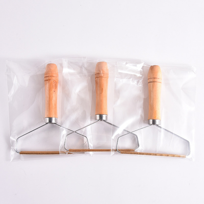 Wooden-Handle Lint Scraper