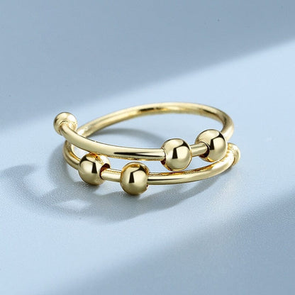 Antistressring – Elegant Fidgetring med Roterande Pärlor
