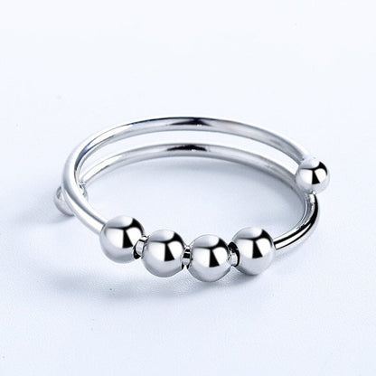 Antistressring – Elegant Fidgetring med Roterande Pärlor