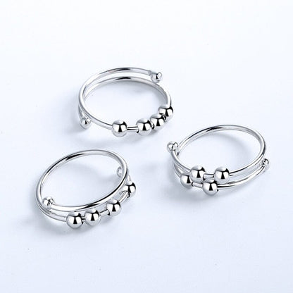 Antistressring – Elegant Fidgetring med Roterande Pärlor
